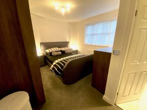 Bedroom One- click for photo gallery